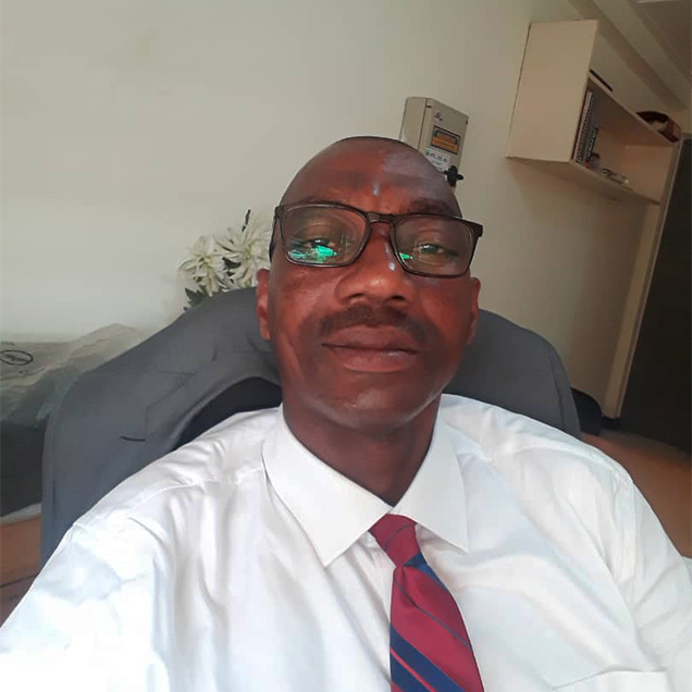 Dr. Gregory A. Komlaga