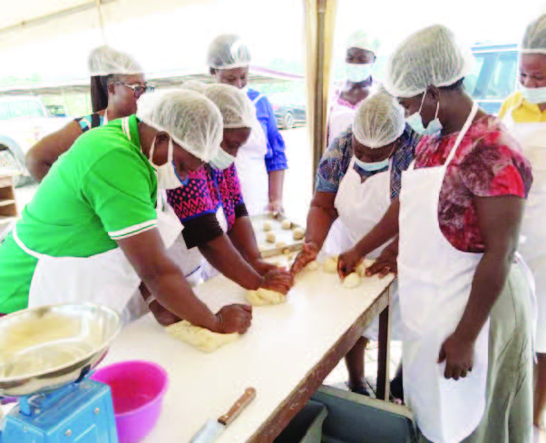 Practical session, using HQCF and plantain flour in product development. Image