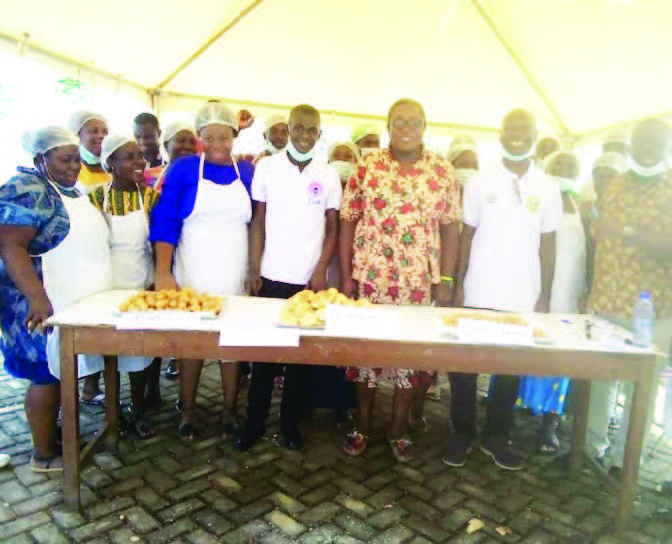 Participants with composite flour products and drop doughnut prepared from sweet potato, HQCF and plantain flour. Image